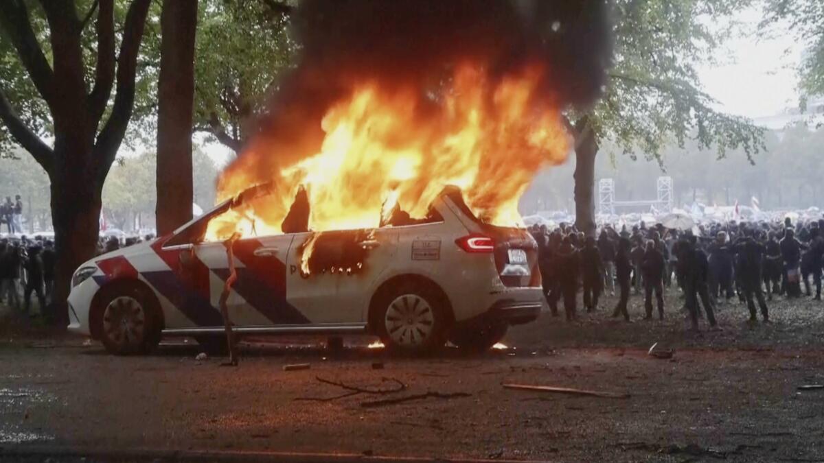 Violence erupts at right-wing demonstration in the Netherlands ahead of election